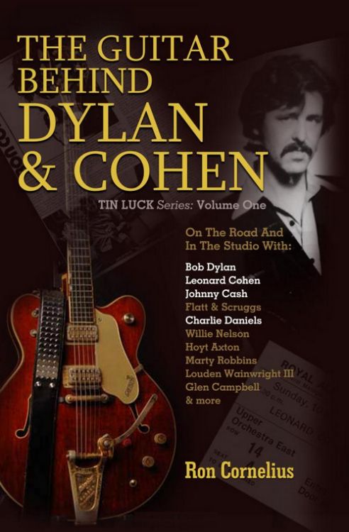 guitar behind Dylan and cohen book